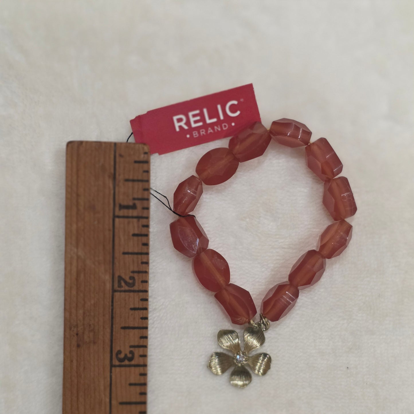 Relic Stretchable Bracelet with Motif Flower Charm Faux Diamond Accent