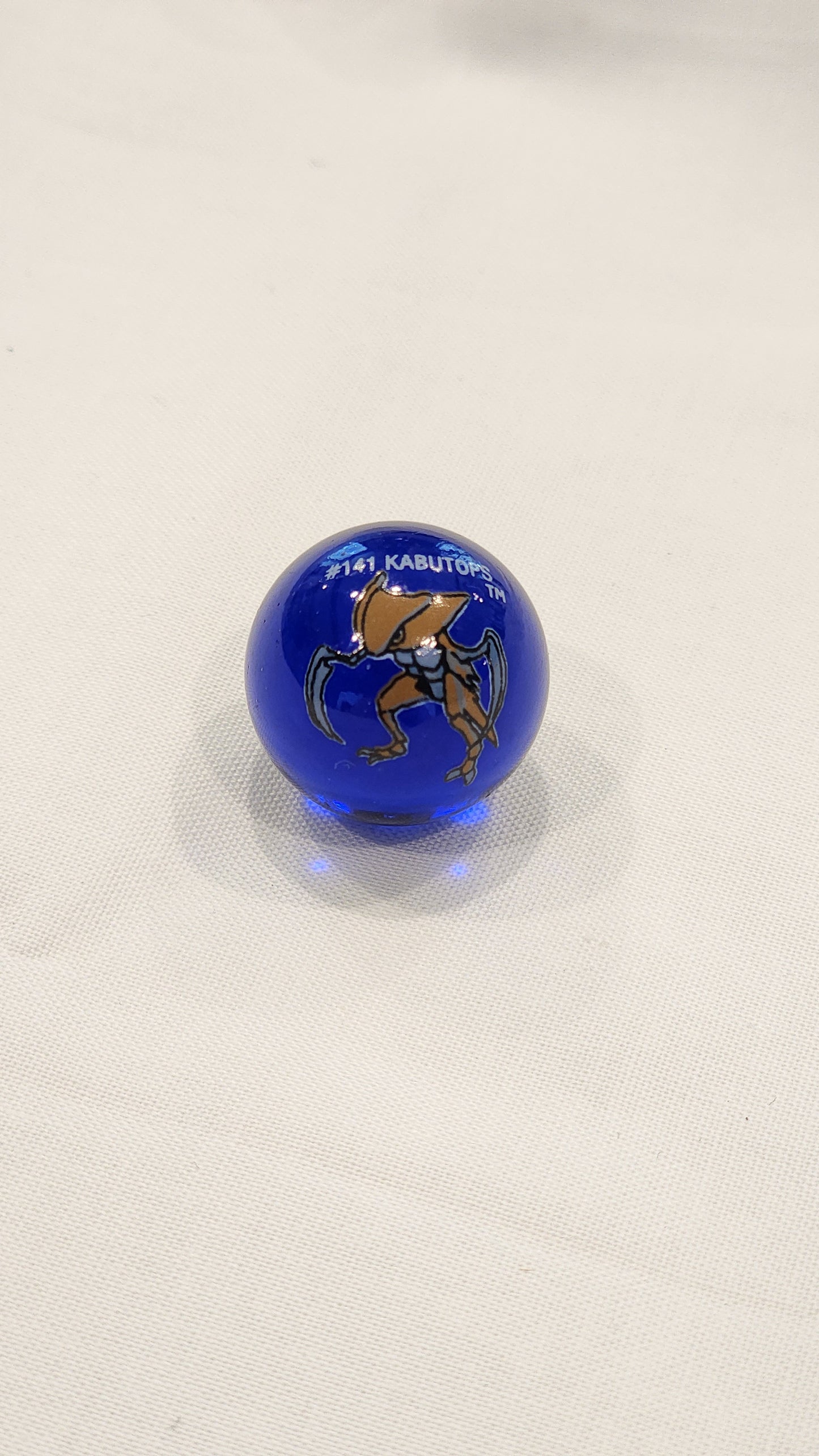 Vintage Pokémon Marble #141 Kabutops – Blue Glass Collector Ball – 1990s Toy