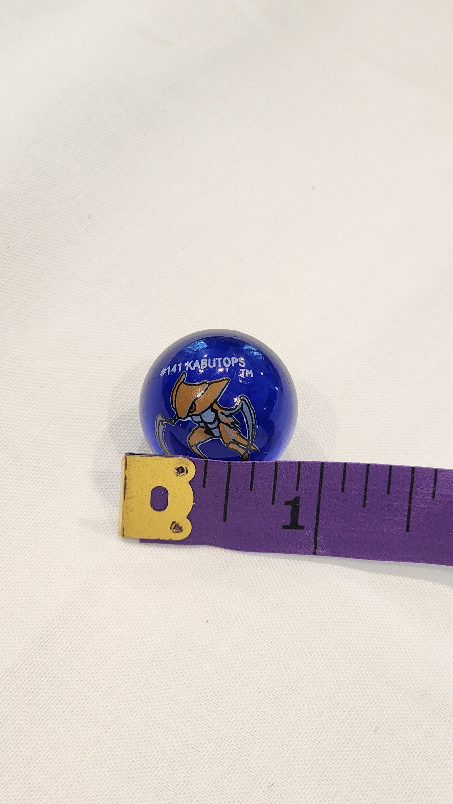 Vintage Pokémon Marble #141 Kabutops – Blue Glass Collector Ball – 1990s Toy